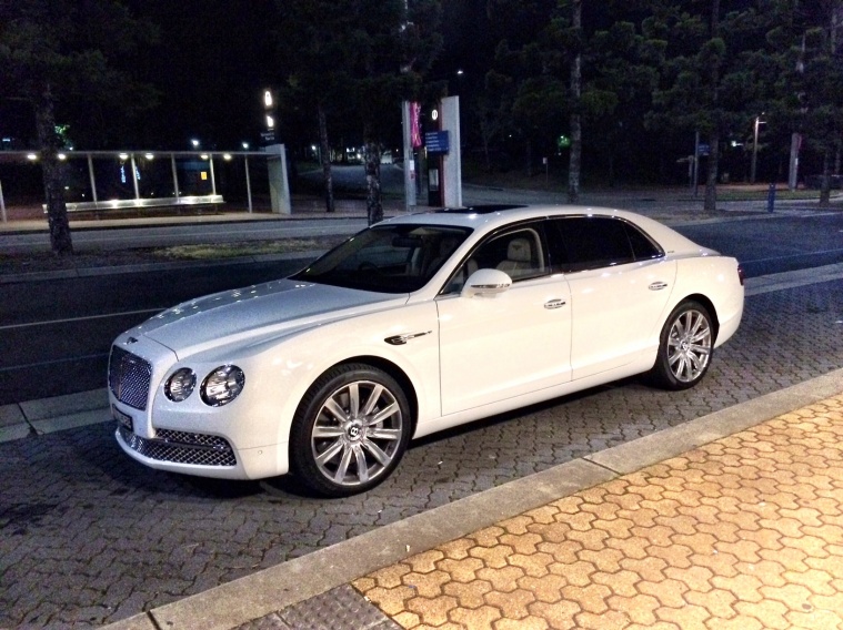 2014 WHITE BENTLEY SEDAN.